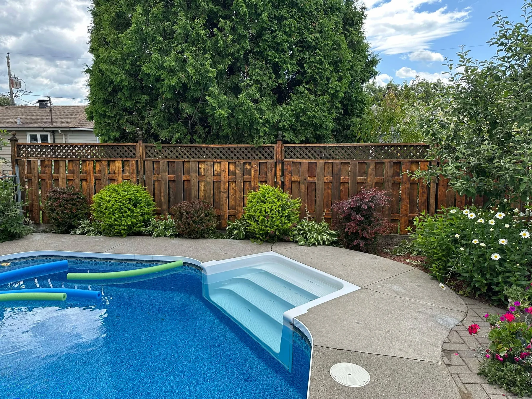 Completed poolside surface work by Go Paint